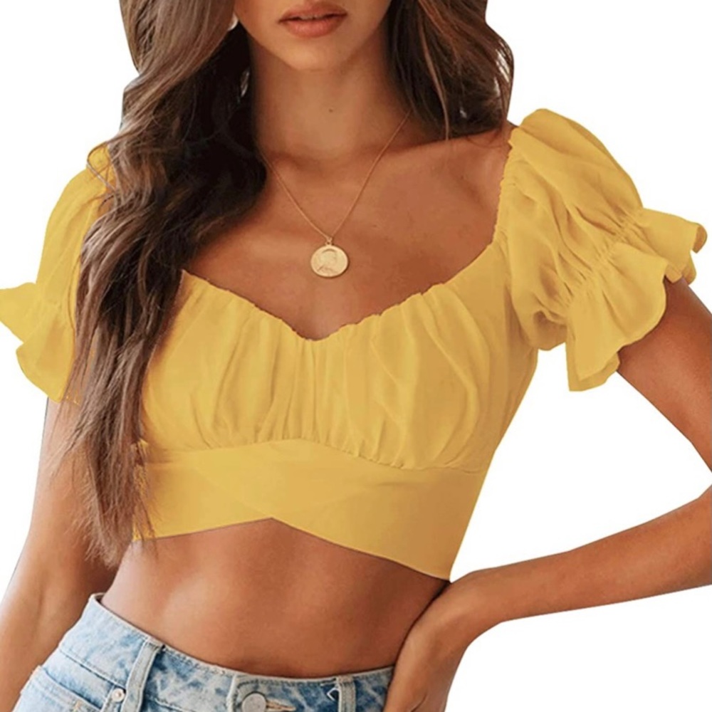 Yellow crop top with tie in back. Brand new and never worn. Medium